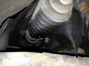 steering fluid leaks from behind the motor